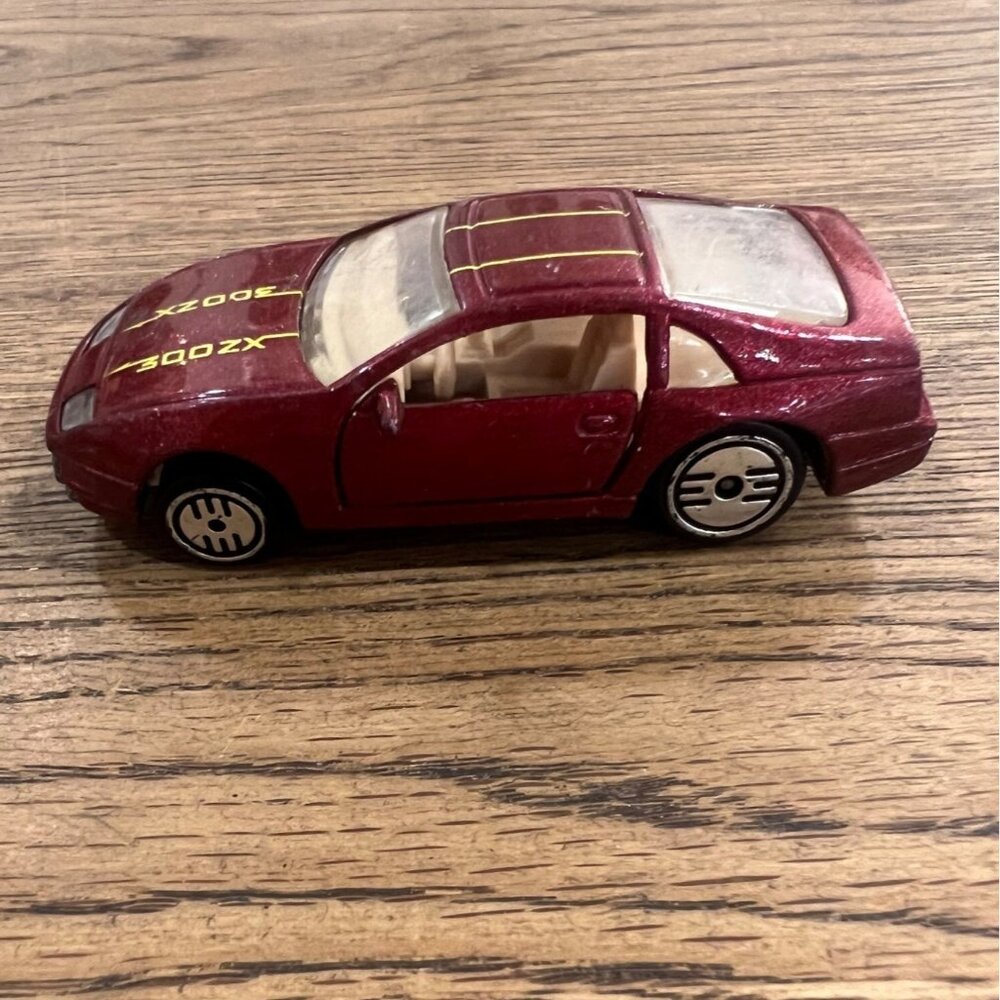 Hot Wheels 1989 Red Nissan 300ZX Die-Cast Toy Car With Opening Door